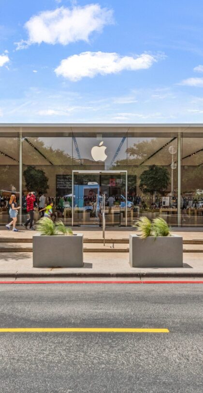 High-end retail storefront with discreetly integrated protective infrastructure.