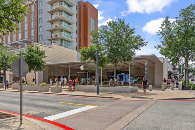 High-end retail storefront with discreetly integrated protective infrastructure.